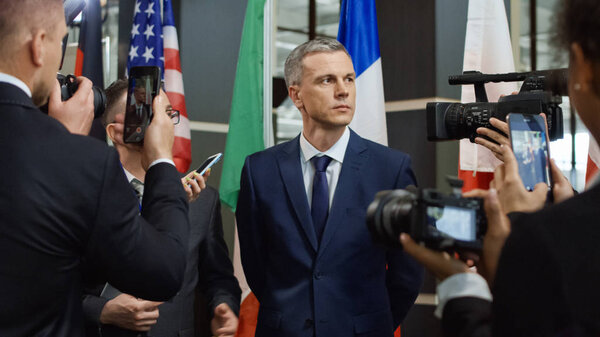 Journalist taking interview from politician