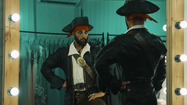 Man in pirate costume rehearsing scene