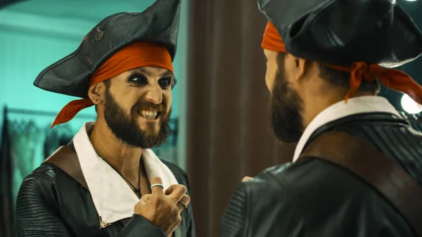 Man in pirate costume rehearsing scene