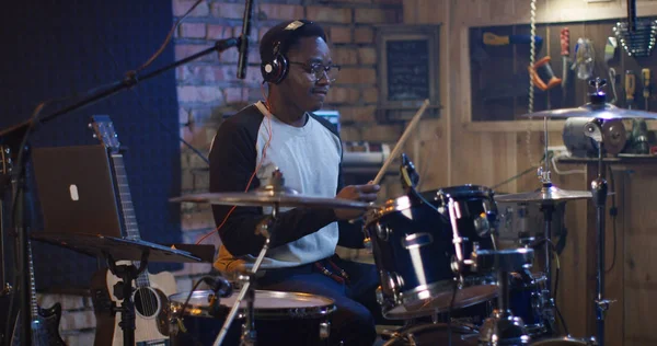 Young men drumming