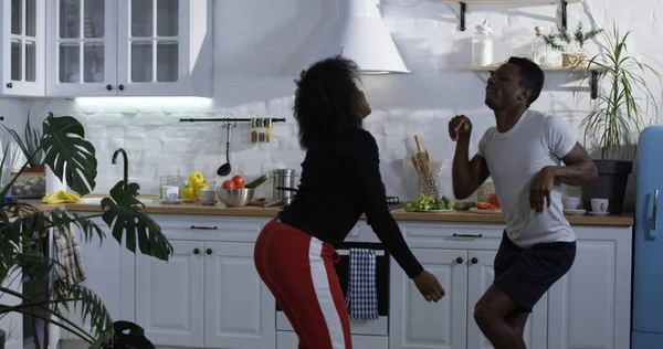 Couple dancing in the kitchen