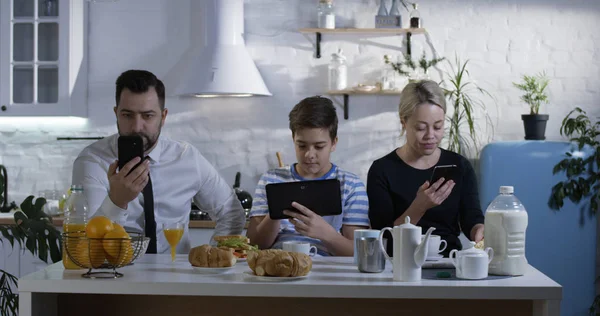 Family sitting at the kitchen table