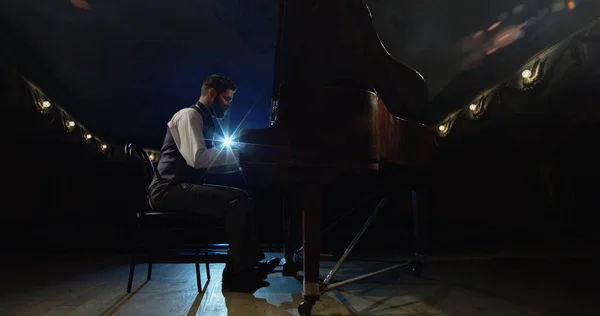 Man playing piano on the stage