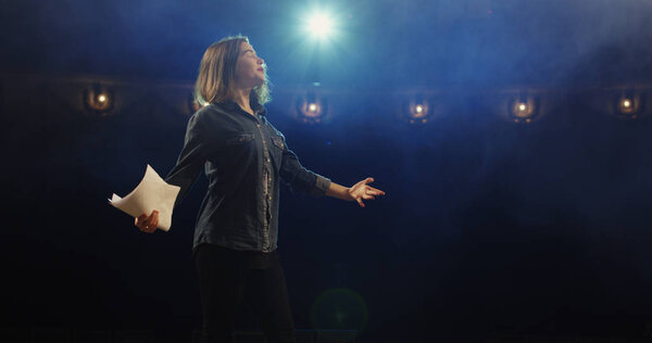 Actress rehearsing in a theater