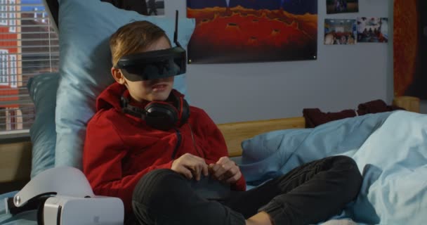 Boy having a video call with VR headset — Stock Video