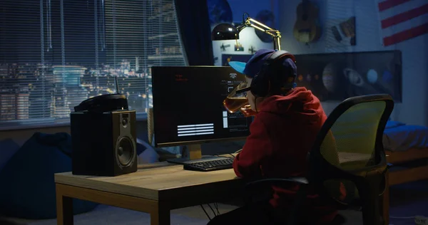 Programmer boy coding on his computer — Stock Photo, Image