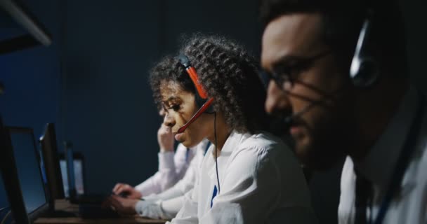 Technicians working at their desks — Stock Video