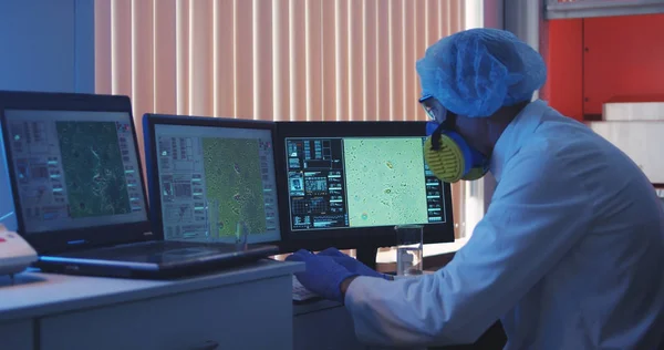 Scientist working at computer