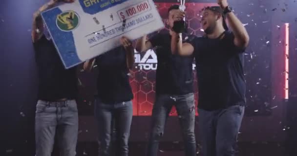 Gaming tournament team celebrating their victory — Stock Video