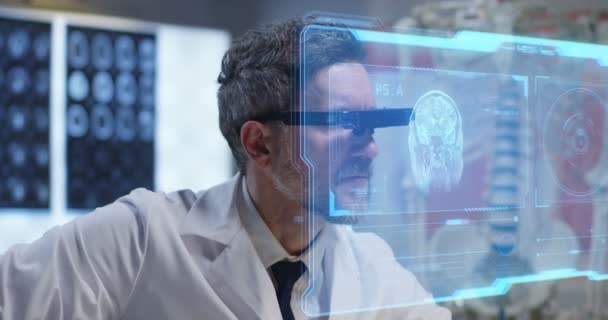 Doctor using holographic display for research — Stock Video