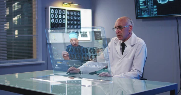 Doctor using holographic display screen