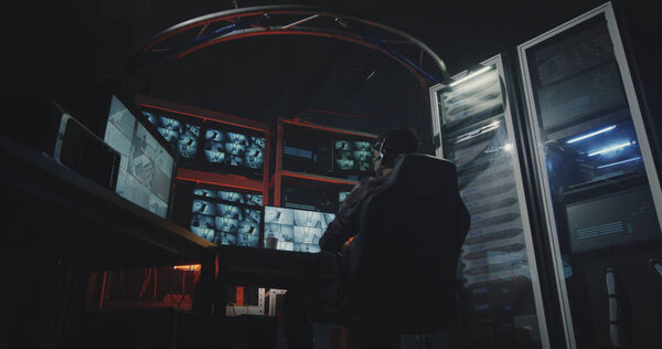 Hacker watching security camera footage