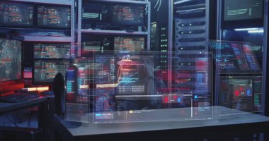 Hacker holografik ekranları izliyor
