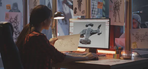 Mujer modelando un avión en la computadora — Foto de Stock