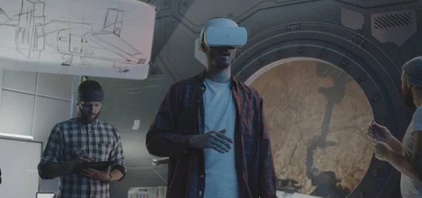 Developers testing VR video game