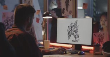 Bilgisayarda uçak modelliği yapan adamlar.