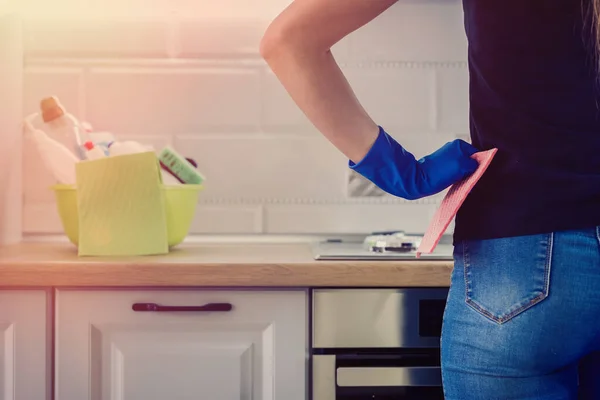 woman cleans in the kitchen. concept of cleanliness