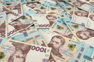 Üst görünüm arkaplanı Ukrayna 'nın yeni banknotuyla birlikte UAH. Finansal geçmiş
