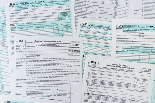 1040 tax form close up on desk. tax time. taxes concept