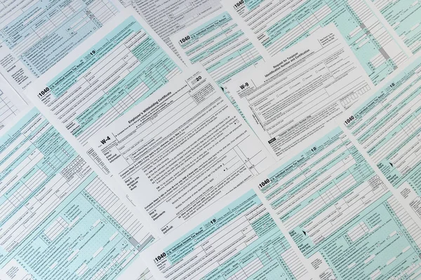 Many different usa tax form. w4 w9 and 1040 form for fill in april. Tax time