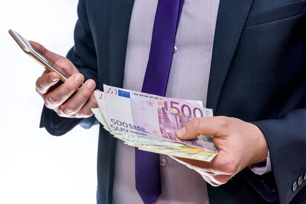 Affärsman Håller Hand Euro Och Annan Telefon — Stockfoto