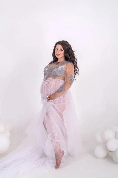 Brunette Pregnant Woman Transparent Dress Posing Studio Waiting Child Stock Picture