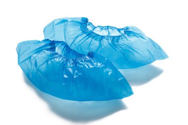 İki mavi Tıp galoş, beyaz arka plan üzerinde izole bütünleşik. Ayakkabı için ayak kapsar. bahily. Hijyen ve temizlik sağlık kurumlarında