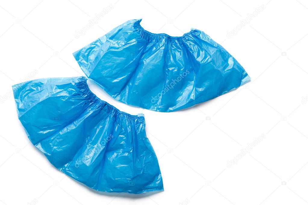 Two medical blue shoe covers overshoes isolated on white background. Catalog top view.