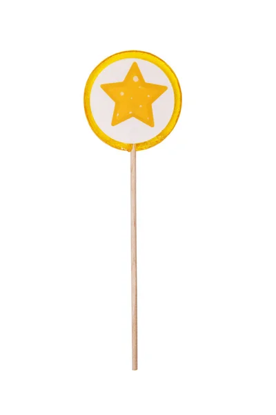 Lollipop med gul stjärna på vit bakgrund. Färgglada handgjorda citron klubba på vit bakgrund. Studioinspelning — Stockfoto