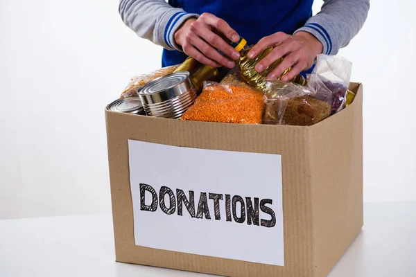 Food Donation Cardboard Box Isolated White Background Volunteer Fills Box — Stock Photo, Image