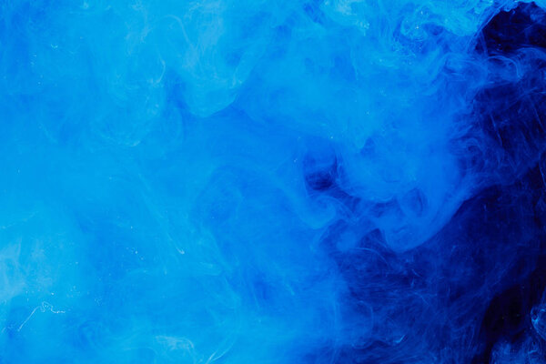 Splash water black water color abstract smoke. Blue ink background