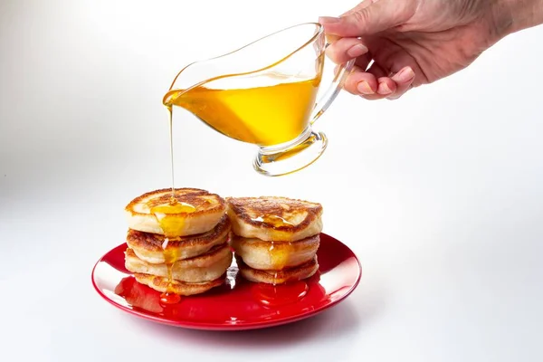 Honey syrup on pancake, delicious dessert food on white,  homemade. — Stock Photo, Image