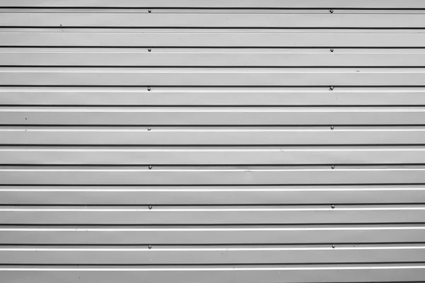 Fond abstrait métal gris ondulé pour mur, métallique . — Photo