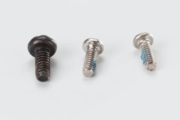 Close up metal screws on white background. — Stock Photo, Image