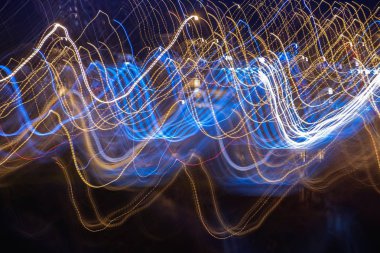 Gece şehir'in bulanık soyut lighhts. Hareket açık renkli.