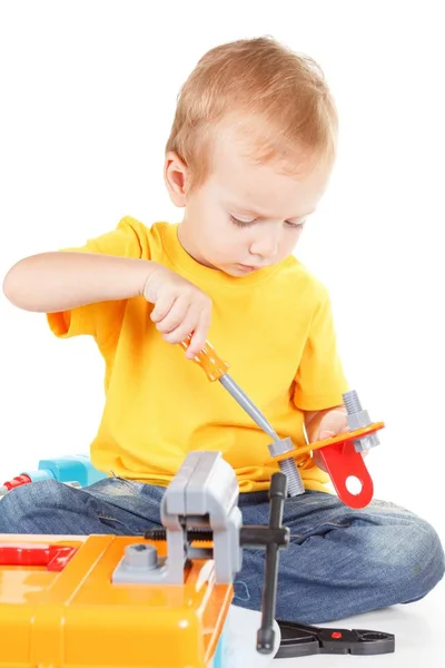 Entzückende Kind Junge mit Werkzeugen glücklich, Spaß. — Stockfoto