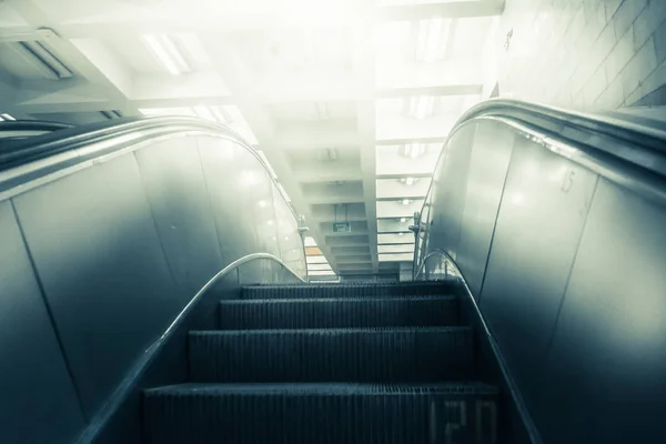 Concept of success in business, moving up the career path. Underground Escalator Conveor in Subway — Stock Photo, Image