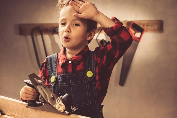 Child fathers day concept, carpenter tool,  person.