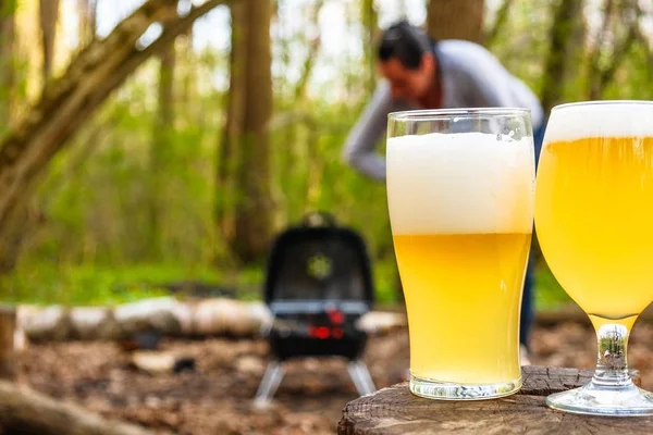 Glass of beer food barbecue and chicken, beverage.