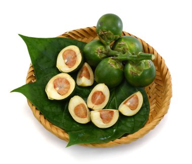 fresh betel nut with betel leaf isolated on white background clipart