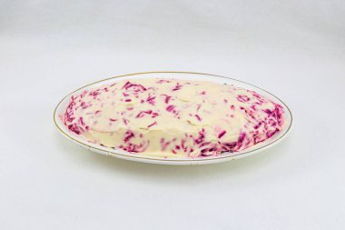 salata ringa kürk altında.