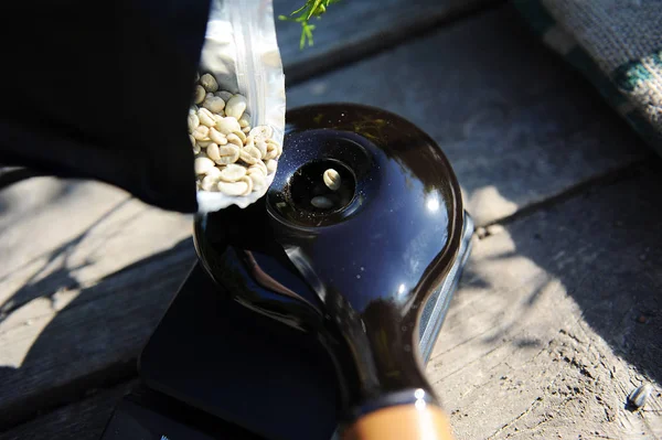 Eco black ceramic handy coffee been roaster — Stock Photo, Image