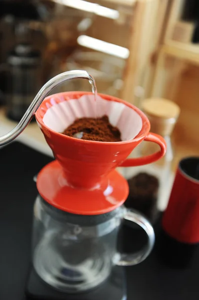 Coffee brewing process. Red ceramic dripper. Gooseneck kettle. Specialty concept — Stock Photo, Image