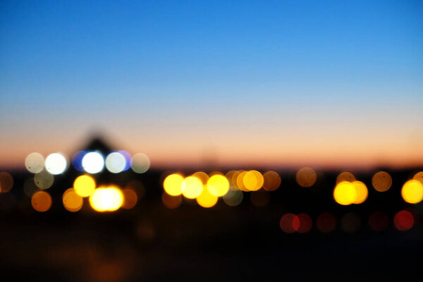 Blurry multicolored night lights of big city