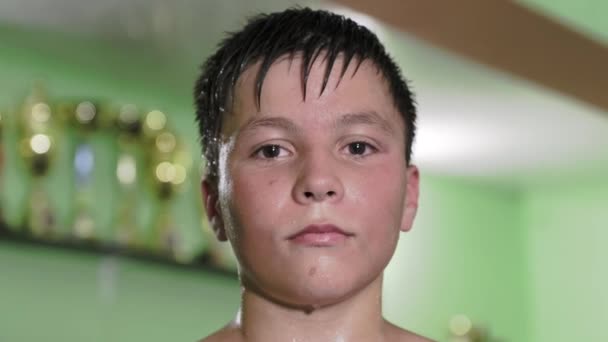 A view of a boy tired and sweaty after the training — Stock Video