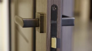 Mortise lock with door handle in interior doors.