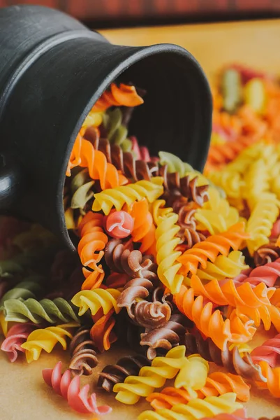 colorful italian fusilli pasta in a jar