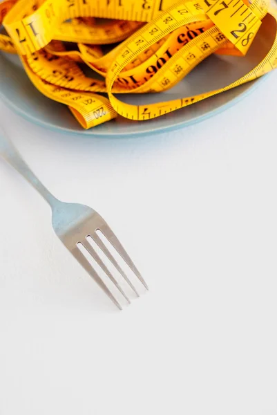 Het Concept Van Het Dieet Vork Teruggespoeld Centimeter Liggen Plaat — Stockfoto