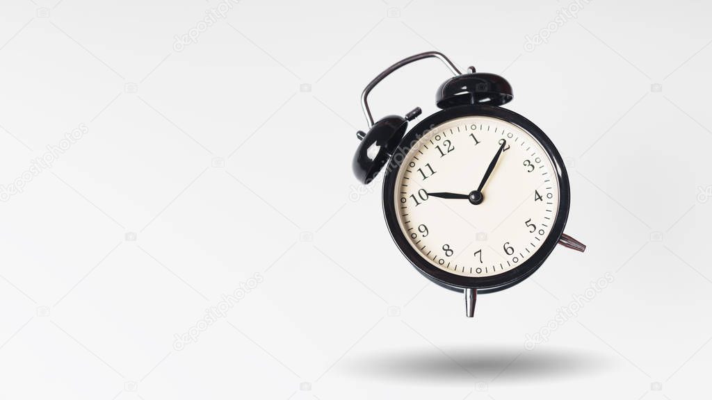 Black alarm clock, concept of time
