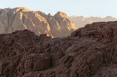 Stunning landscape of rocky peaks against a blue sky. Mount Sinai (Mount Horeb, Gabal Musa). Sinai Peninsula of Egypt. Famous touristic place and travel destination in Egypt. clipart